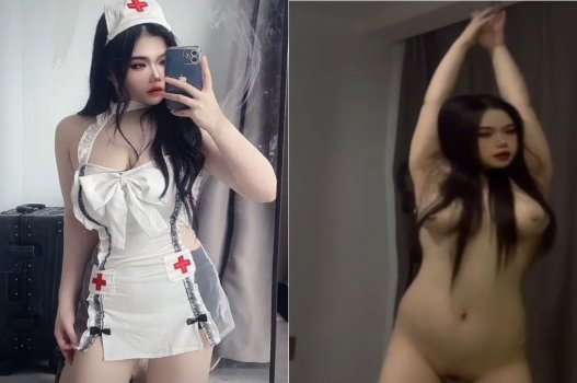 Bác sĩ xinh đẹp thực hiện việc chăm sóc người bệnh